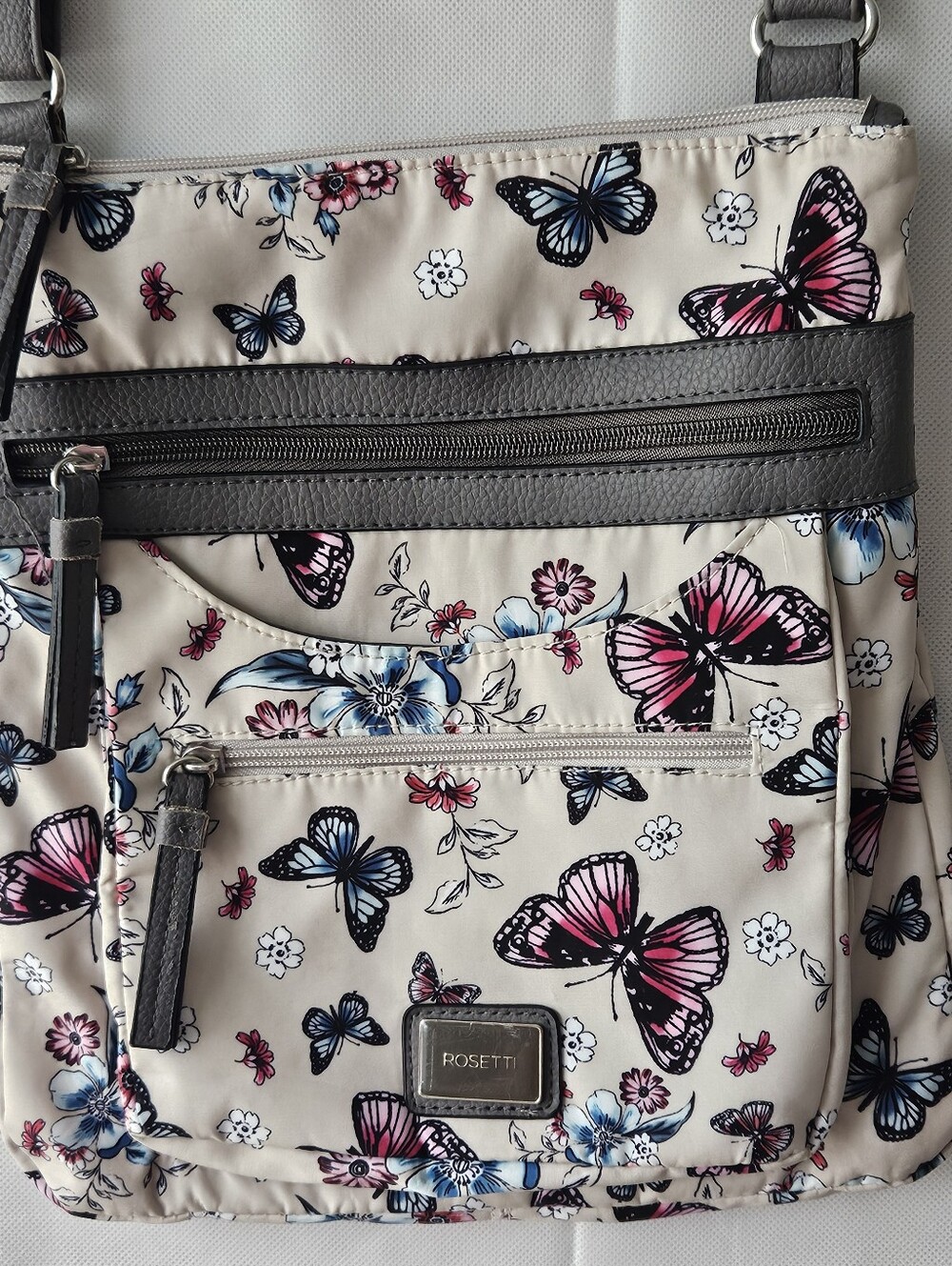 Rosetti Beige Crossbody Bag with Pink and Blue Butterfly Print Watwrproof